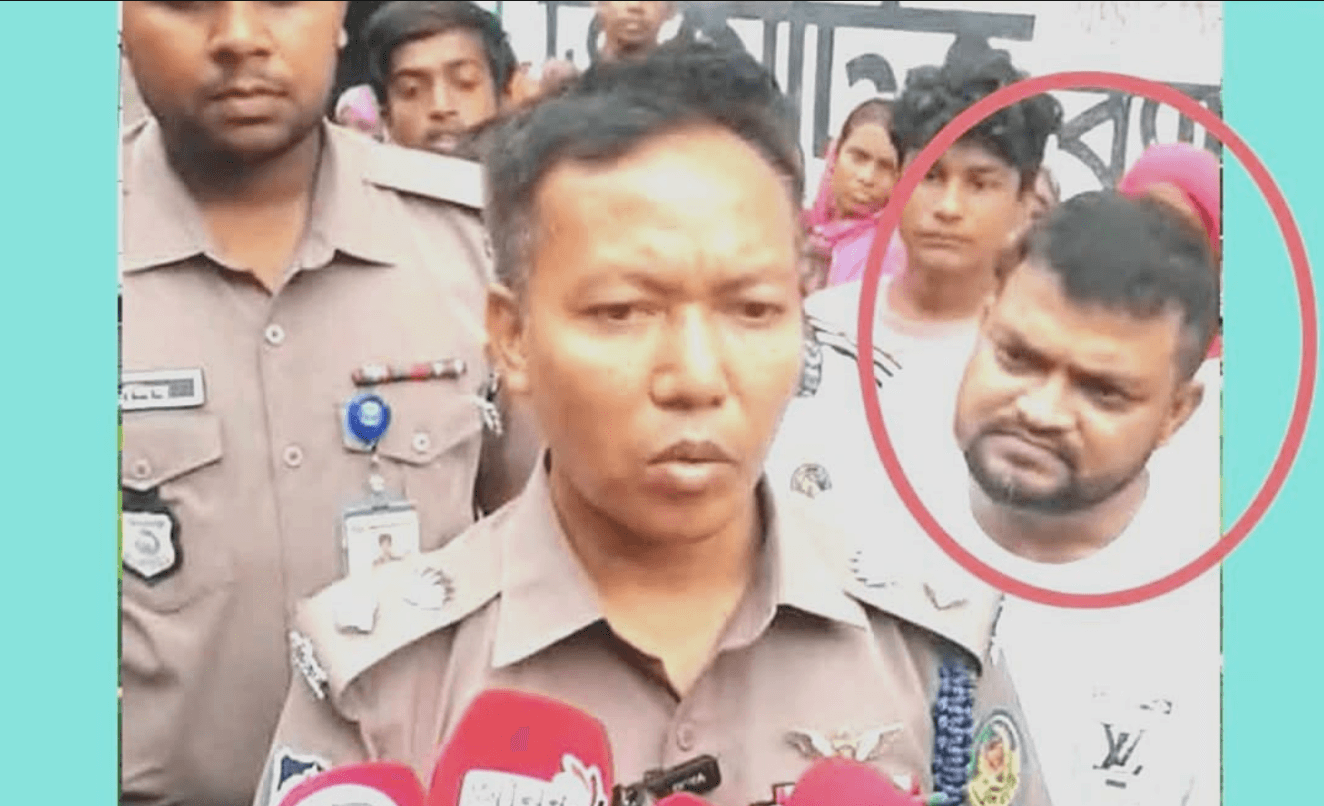 ‘পলাতক’ আসামি প্রকাশ্যে, ডিসির পাশে  ভূমিকা নিয়ে প্রশ্ন